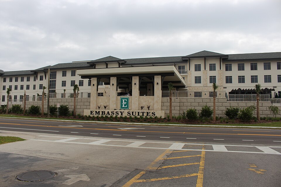 Signed street-facing exterior of Embassy Suites St. Augustine Beach Oceanfront Resort, photographed in 2019.