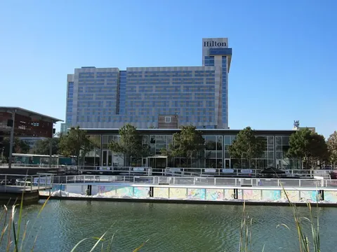 Hilton Americas-Houston tower behind Discovery Green, photographed in 2012.