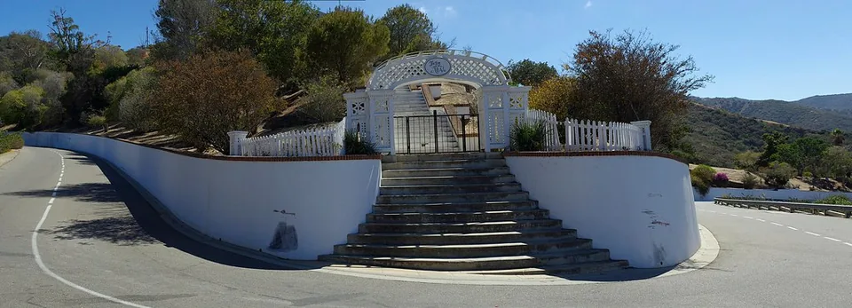 Signed entrance and hillside guest building at Mt Ada on Catalina Island, photographed in 2014.