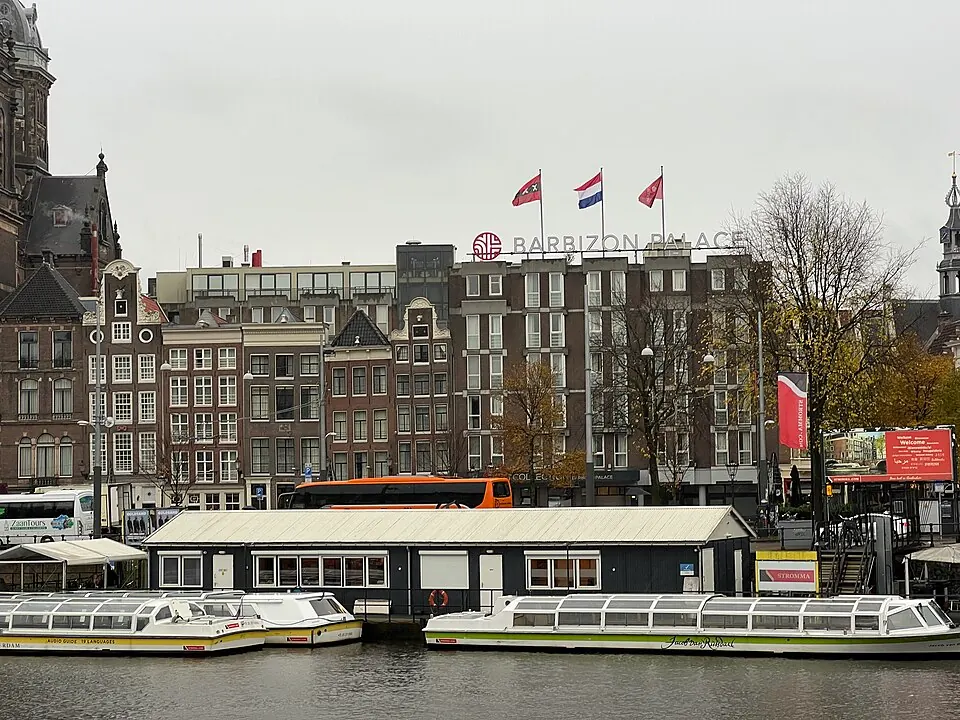 NH Collection Amsterdam Barbizon Palace beside the canal, photographed in 2024.