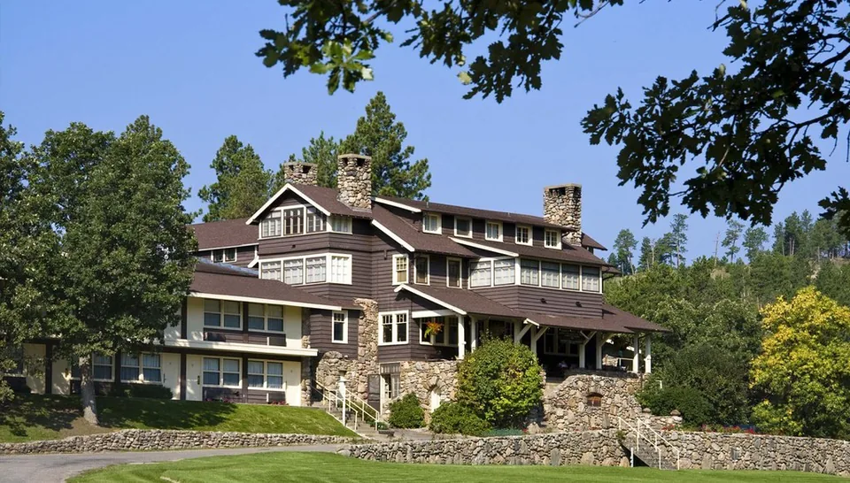 Historic stone and wood State Game Lodge in Custer State Park, photographed in 2022.