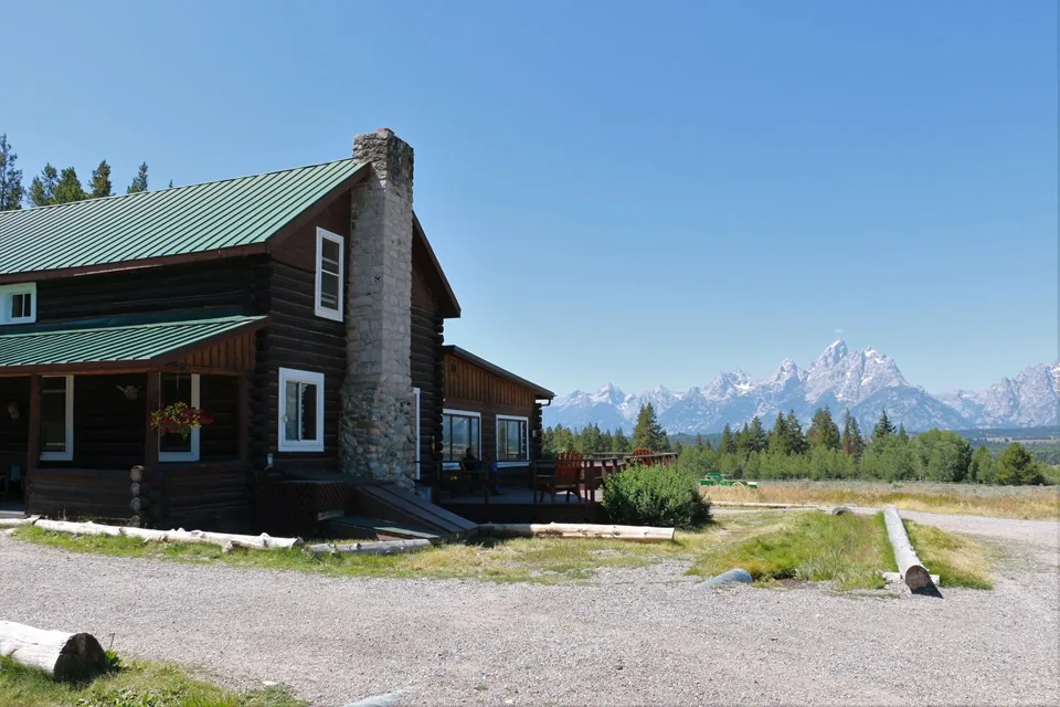 Triangle X Ranch building with the Teton mountain setting, photographed in 2015.